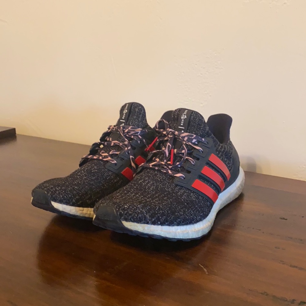 Adidas black with red stripes running shoes